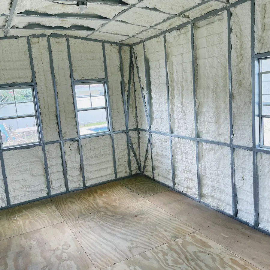 Closed-cell spray foam insulation applied to wall cavities in a residential project in Honeygo